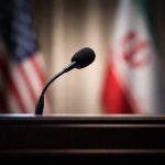 trump iran peace deal good news april 2026 blurred diplomatic podium uncertainty