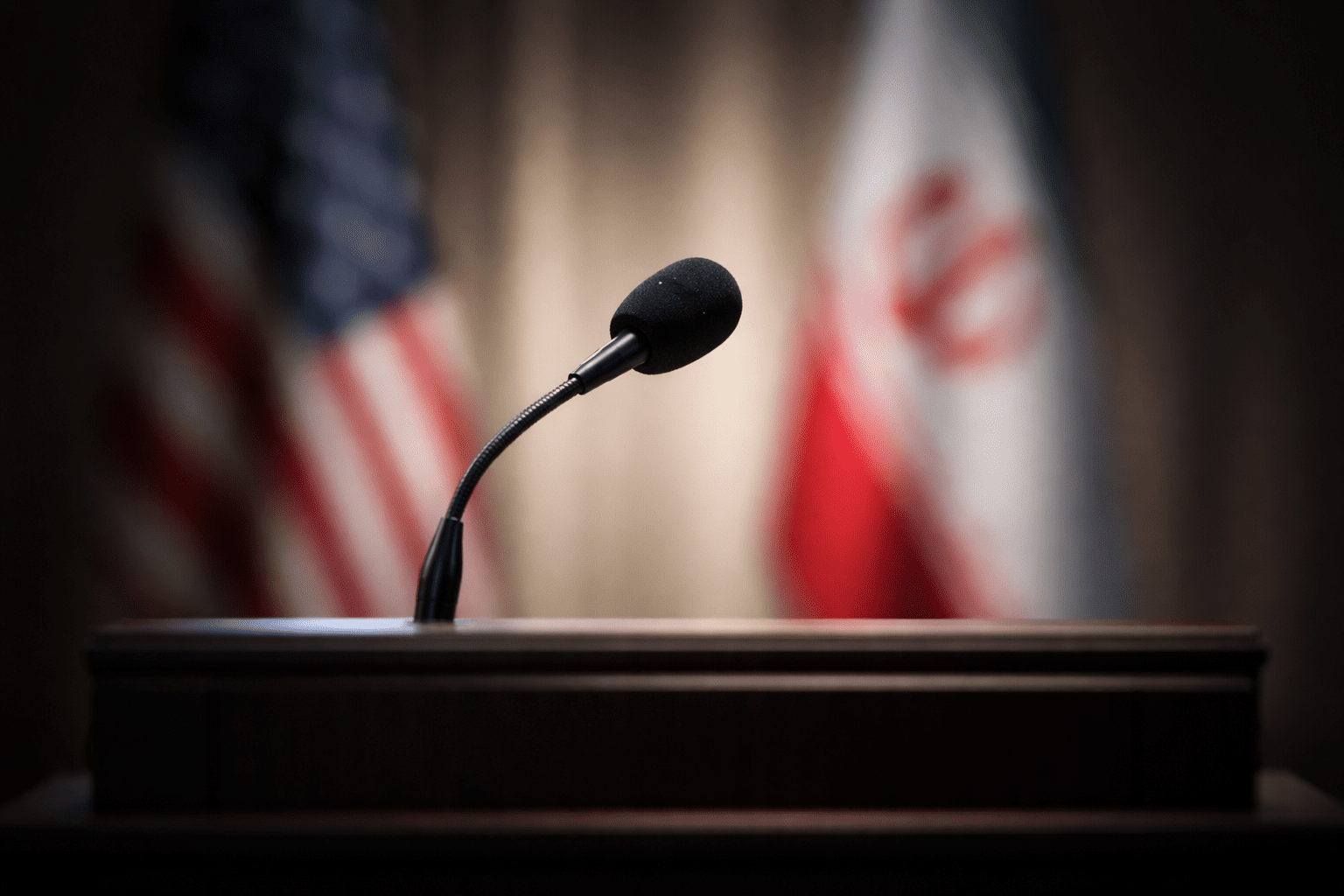 trump iran peace deal good news april 2026 blurred diplomatic podium uncertainty