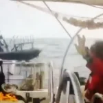 Gaza aid flotilla intercepted at sea showing humanitarian ships and naval enforcement tension